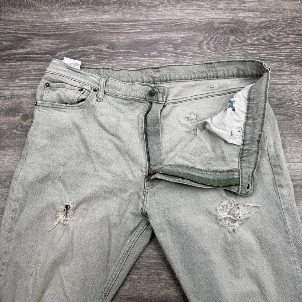 Levis 512 Slim Taper Jeans Mens 42x32 Light Gray Distressed Ripped 5 Pocket Fade